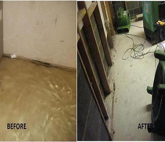 Servpro Equipment in an Almost Dried Out Floor and Gutted Walls